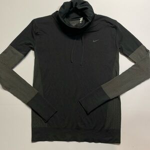 Nike woman’s black long sleeve cowl neck athletic top. Size S